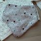 Dribble baby bib with small snowman pattern