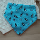 Baby dribble bib in blue with penguins