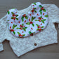Baby bib with festive holly berry design