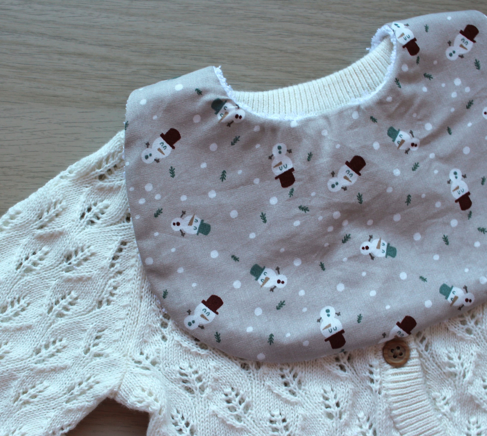 Snowman themed baby bib