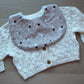 Baby bib with small snowman design