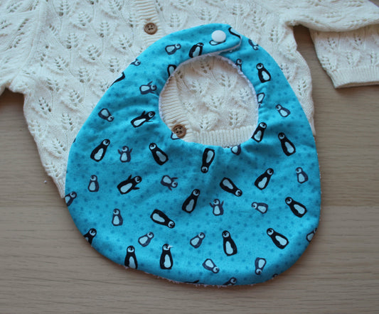 Penguin themed festive baby bib