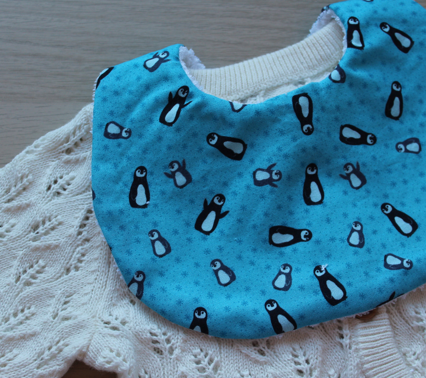 baby bib with penguins