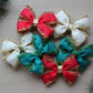 Hair bows with festive tinsel