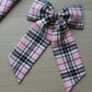 Pink and black plaid tartan hair bow