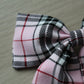 Pink and black plaid tartan hair bow