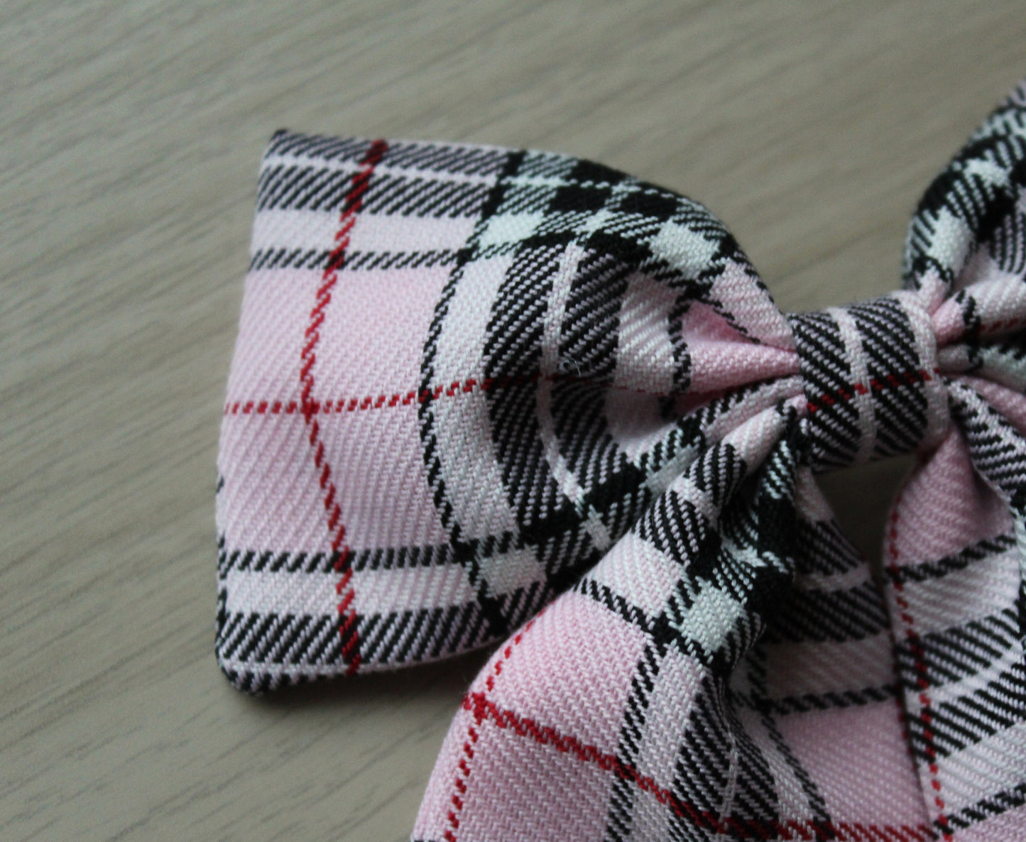 Pink and black plaid tartan hair bow
