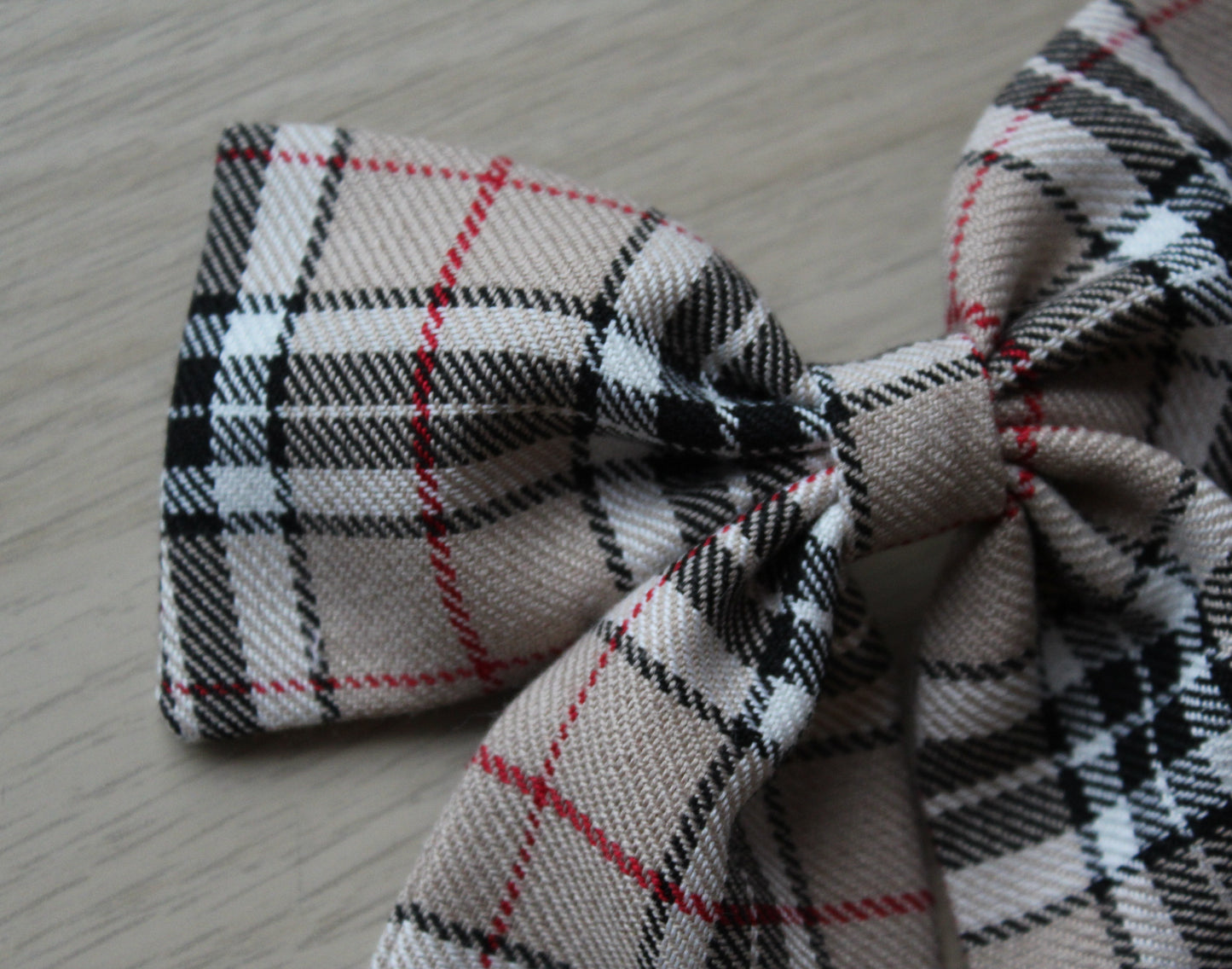 Beige and black plaid tartan hair bow