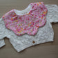 Ditsy pink floral scallop baby bib