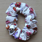 Hair scrunchie with white background and butterflies