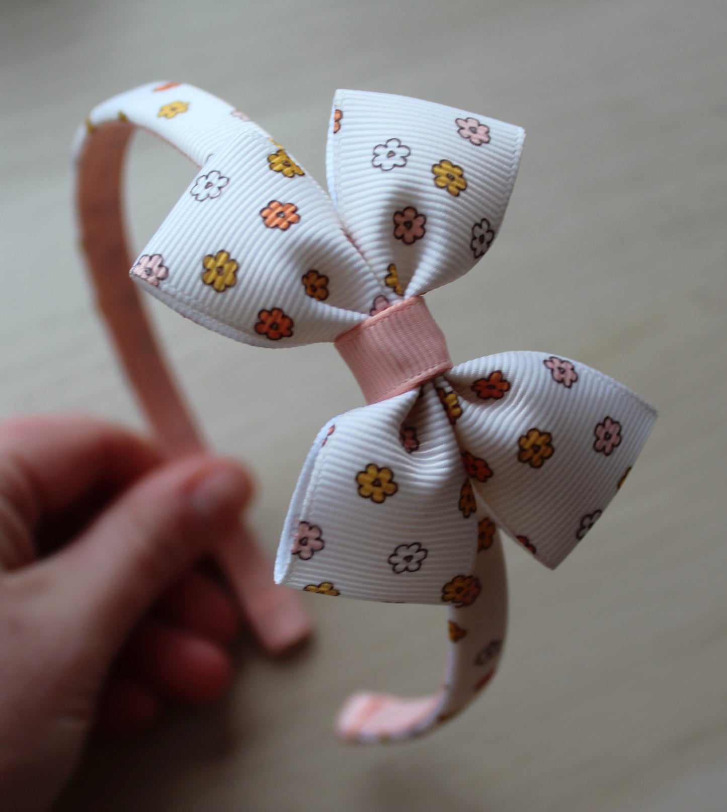 Nude floral bow on a headband
