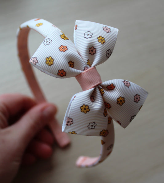 Nude floral bow on a headband