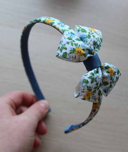 Floral headband with bow in blue