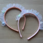 Headbands with tulle frill and pom poms 