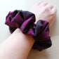 Lindsay tartan pink and green oversized hair scrunchie on wrist
