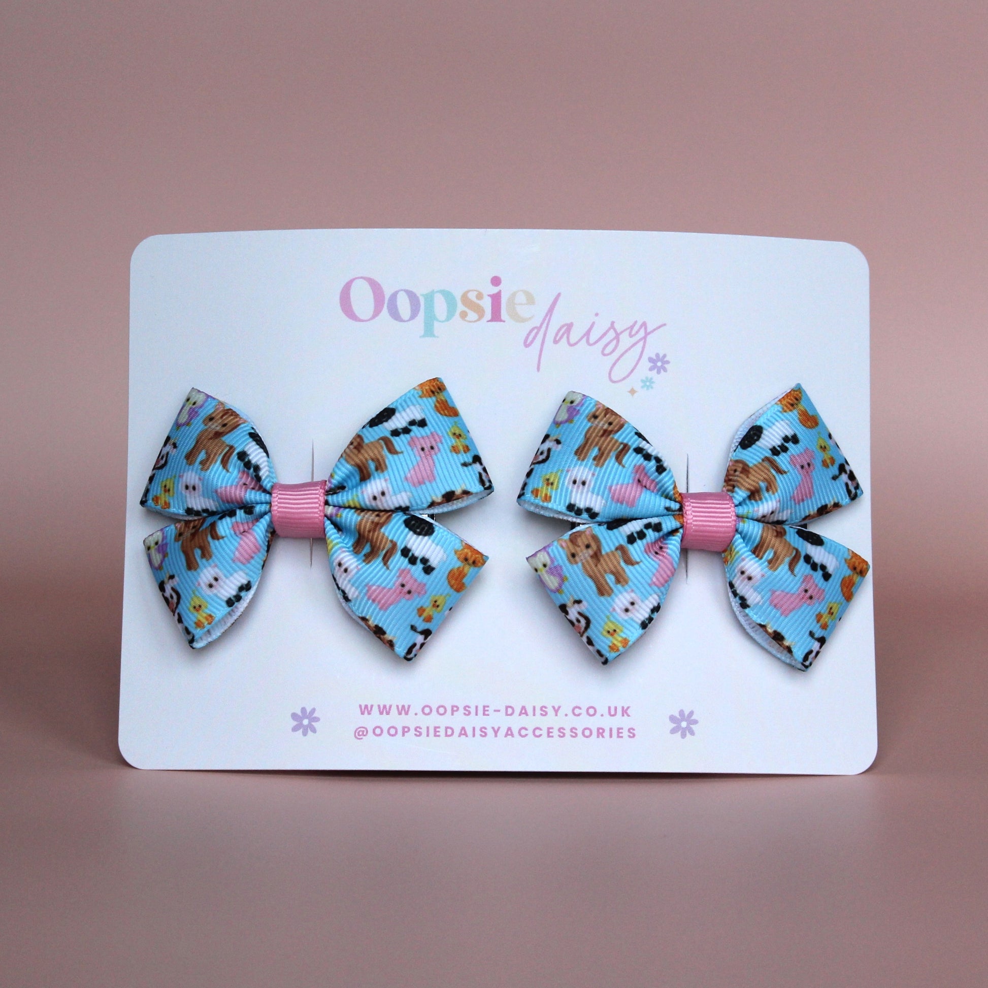 Pair colourful baby animal bow hair clips. 