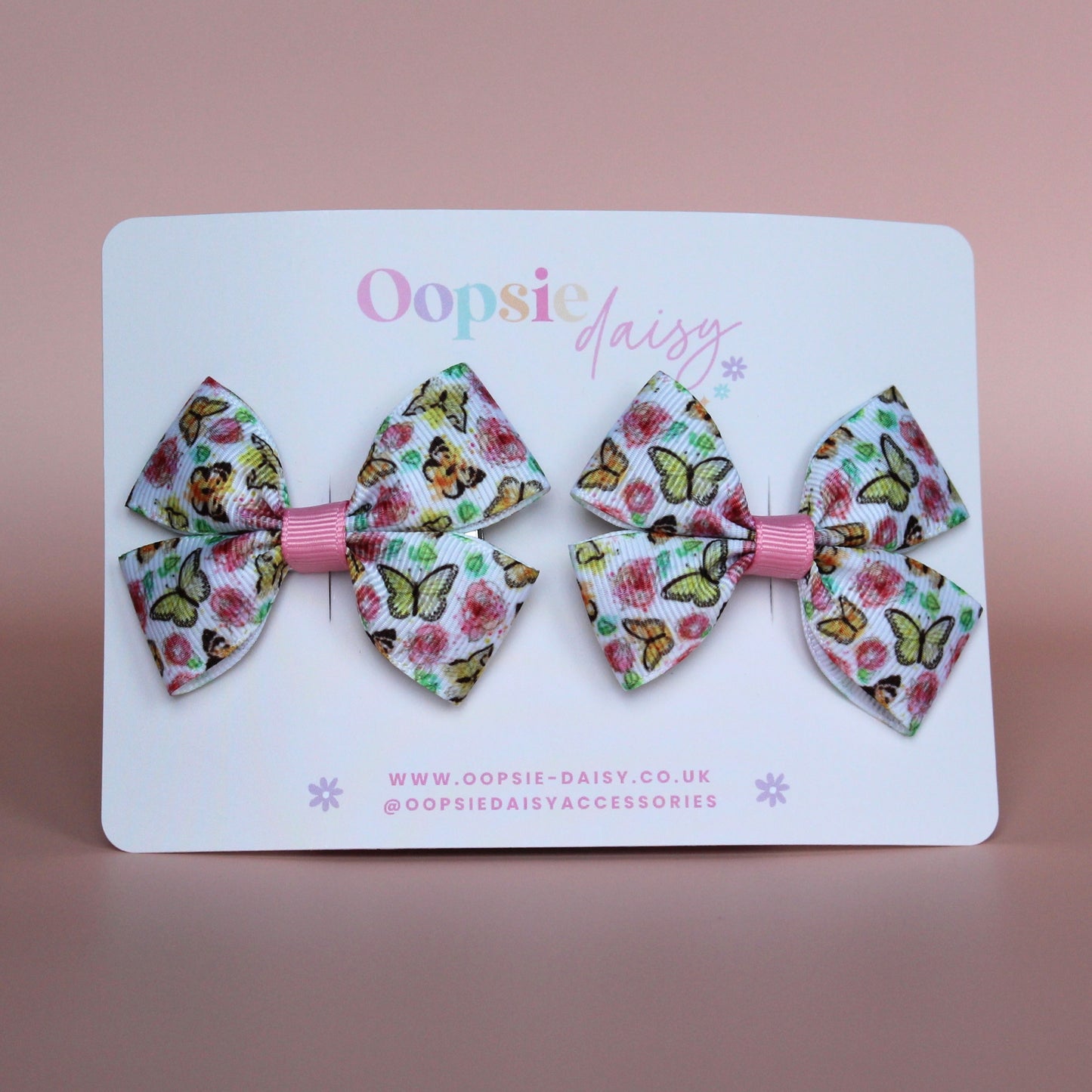 Pair hair bow clips with vintage butterfly design