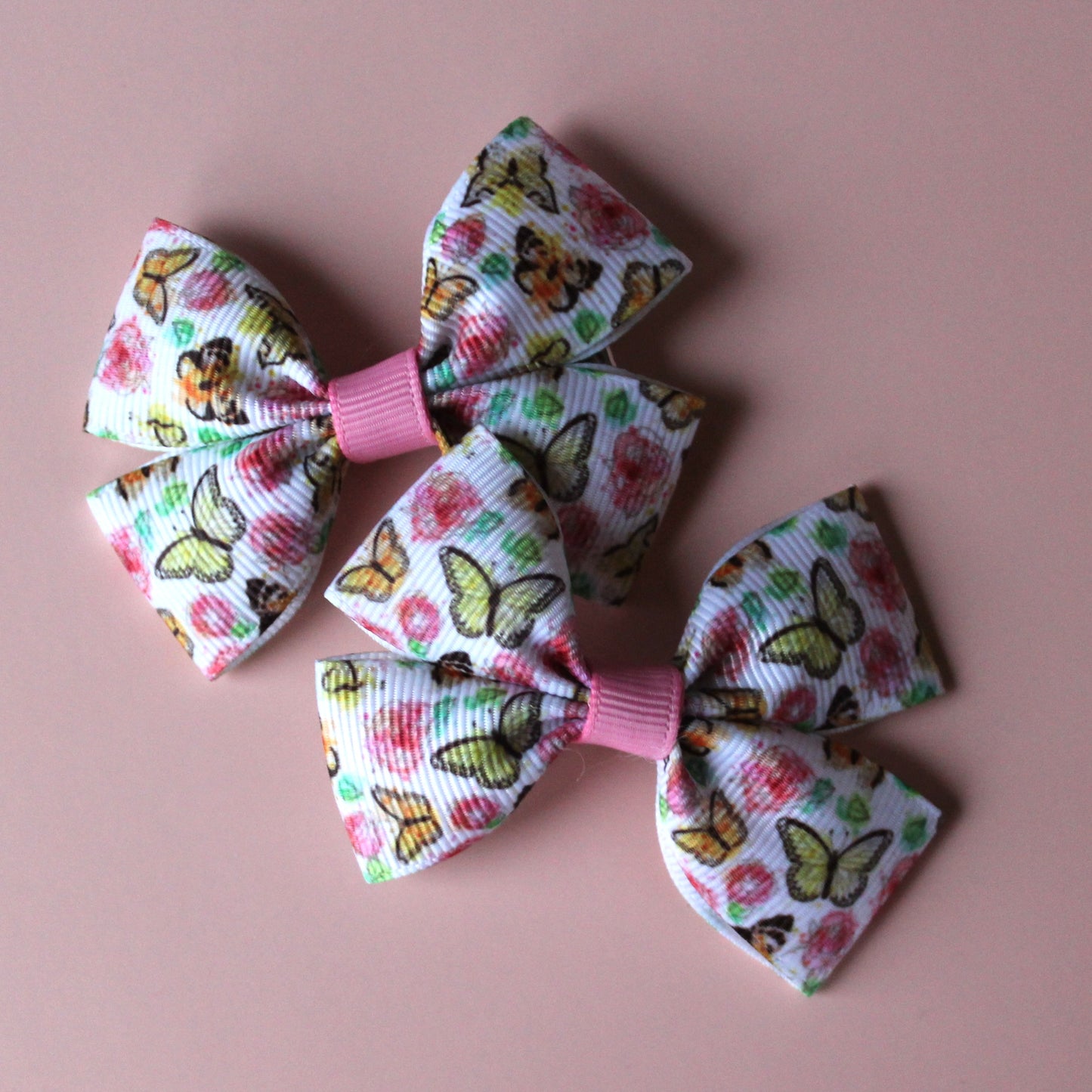 Pair hair bow clips with vintage butterfly design
