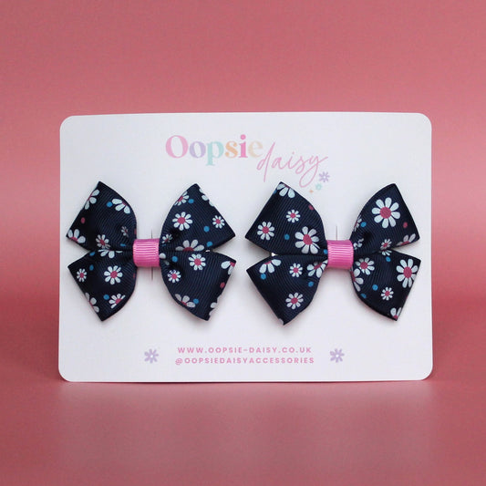 Navy hair bows with pink and white daisy pattern