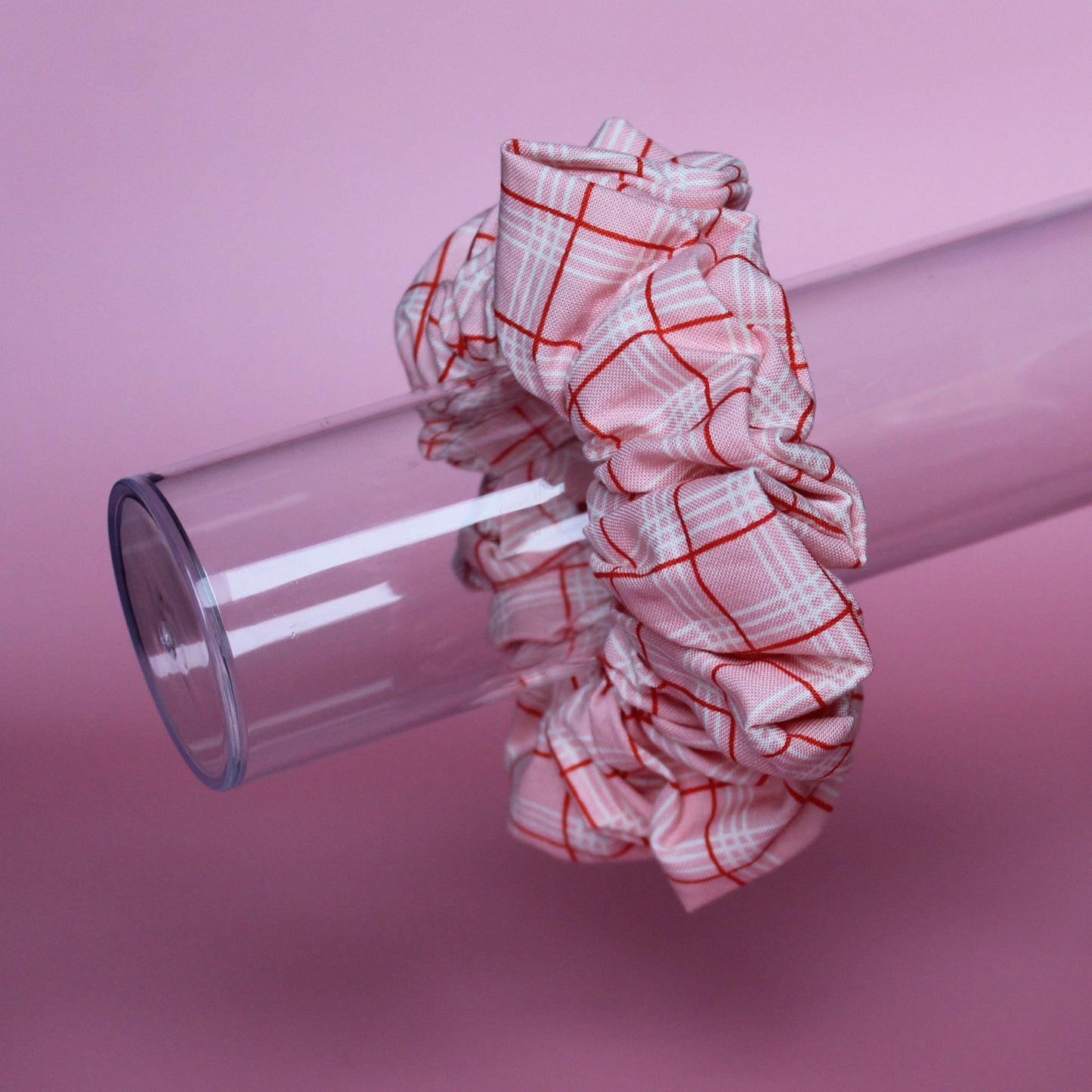 Pink oversized hair scrunchie with red and white check pattern