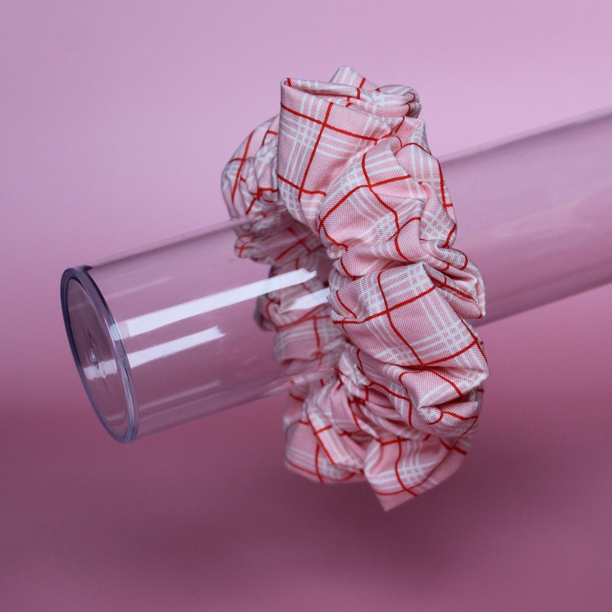 Pink oversized hair scrunchie with red and white check pattern