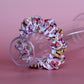 White scrunchie with bold pink and orange butterflies