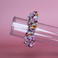 White scrunchie with bold pink and orange butterflies
