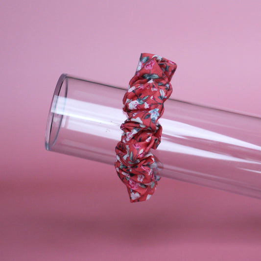 Reddish-pink floral hair scrunchie