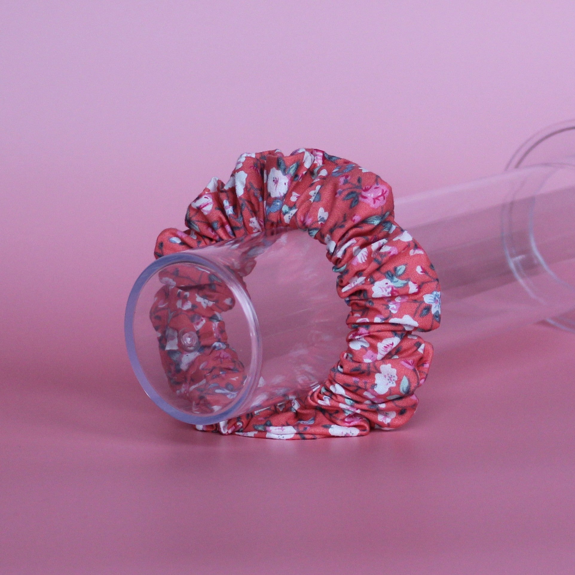 Reddish-pink floral hair scrunchie