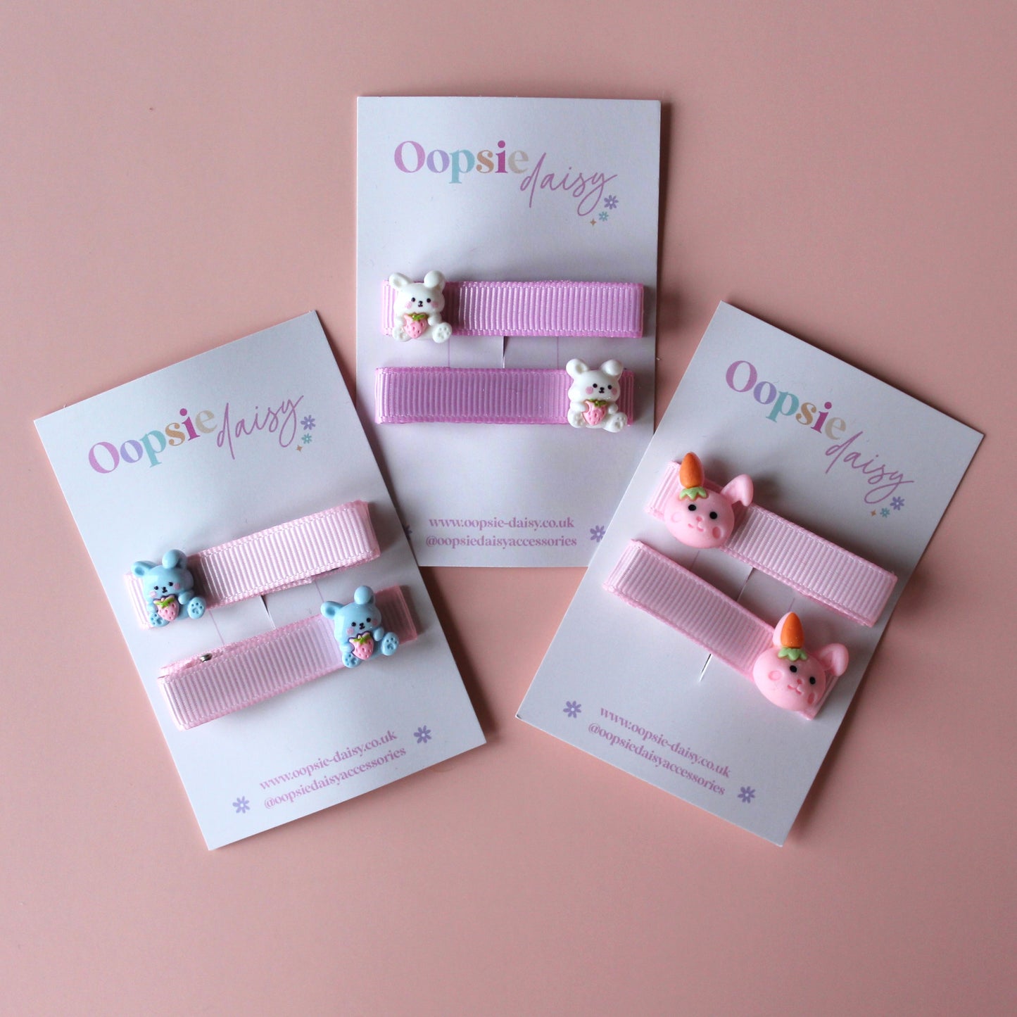 Pink hair clips with bunny rabbit embellishments