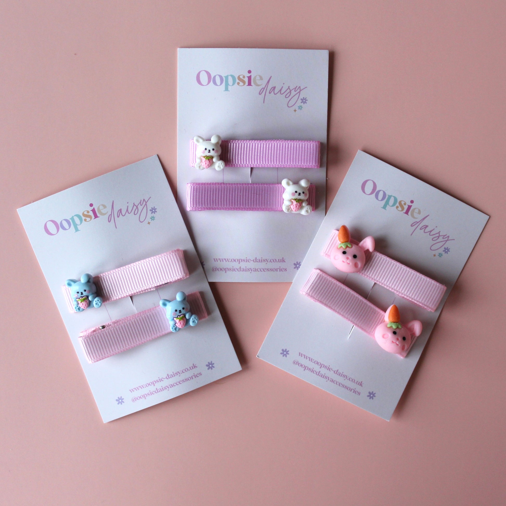 Pink hair clips with bunny rabbit embellishments