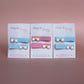Hair slider clips with rainbow embellishments