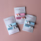 Hair slider clips with rainbow embellishments