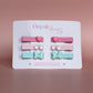 Set of colourful hair sliders with heart, rainbow and butterfly embellishments
