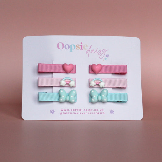 Set of colourful hair sliders with heart, rainbow and butterfly embellishments