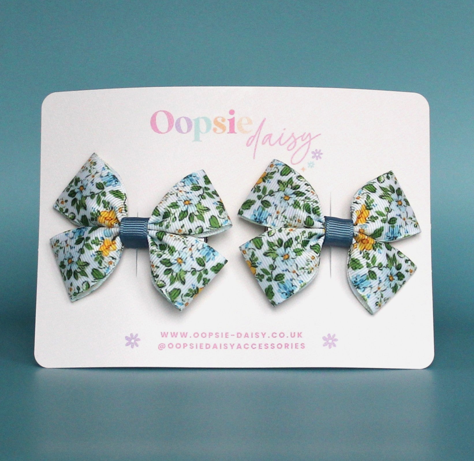 Ditsy blue floral hair bow clips