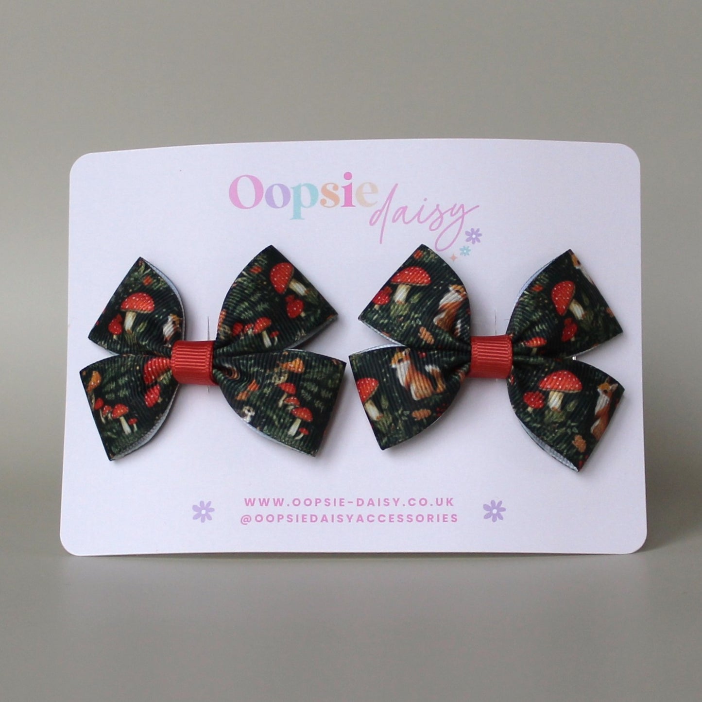 Autumnal woodland patterned hair bows with squirrels and mushrooms