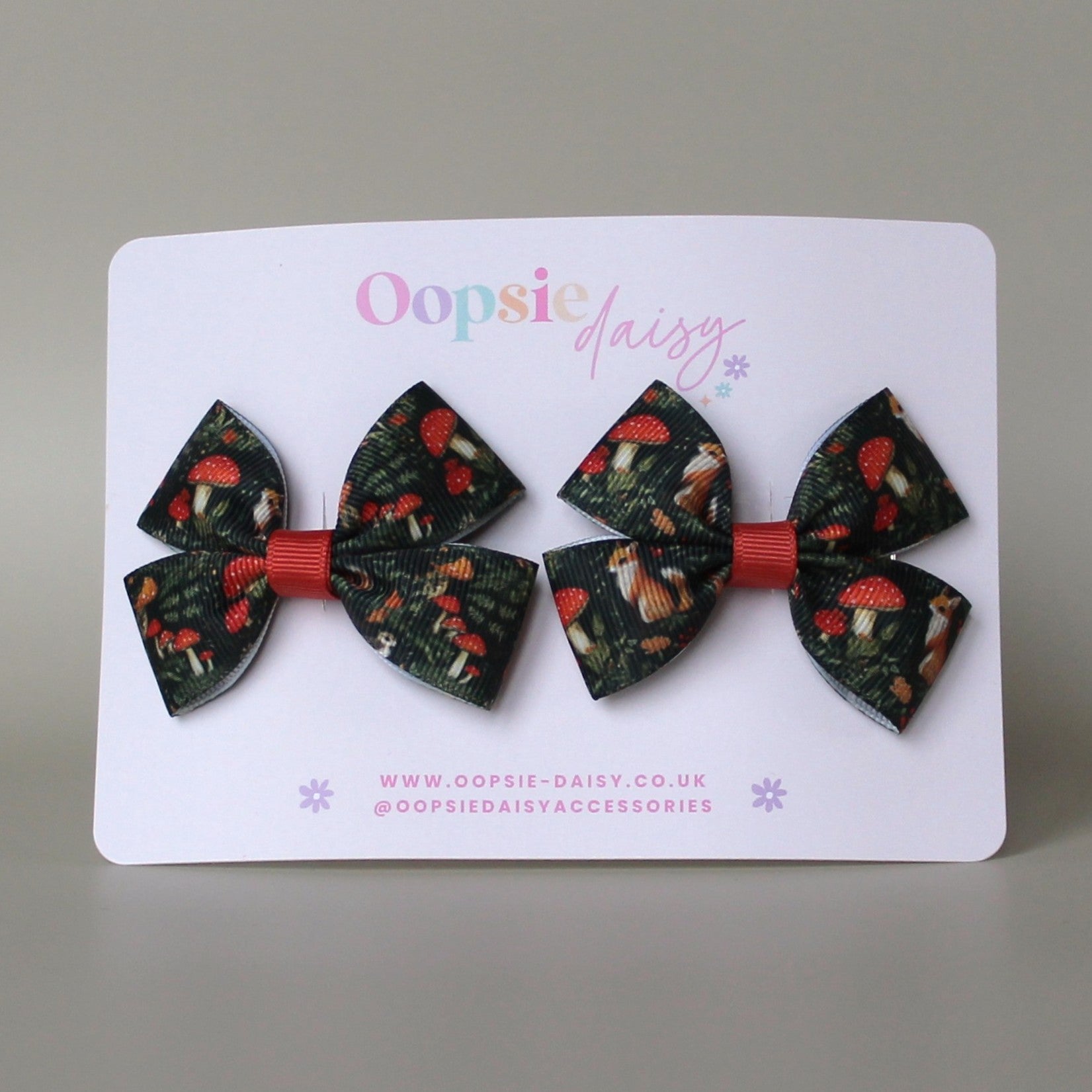 Autumnal woodland patterned hair bows with squirrels and mushrooms
