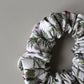 Hair scrunchie with thistle pattern