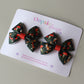 Autumnal woodland patterned hair bows with squirrels and mushrooms