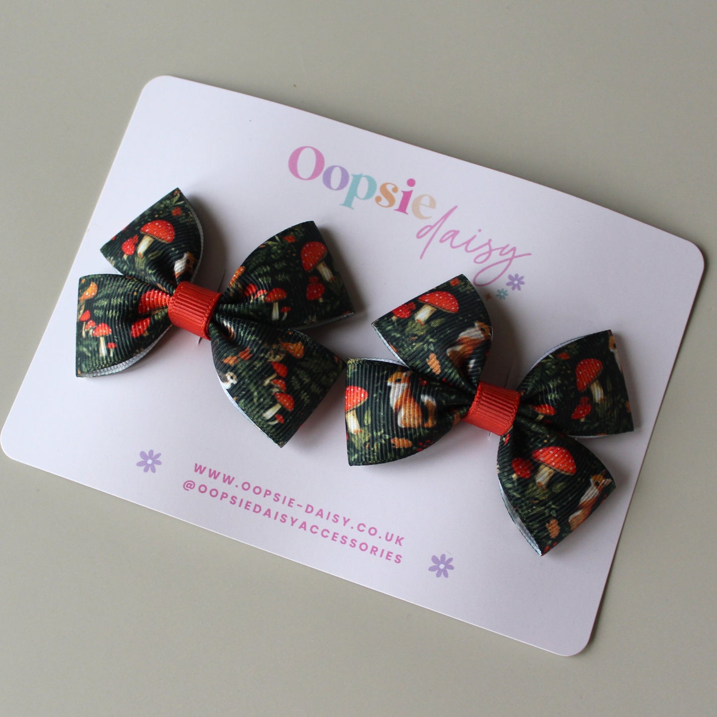 Autumnal woodland patterned hair bows with squirrels and mushrooms