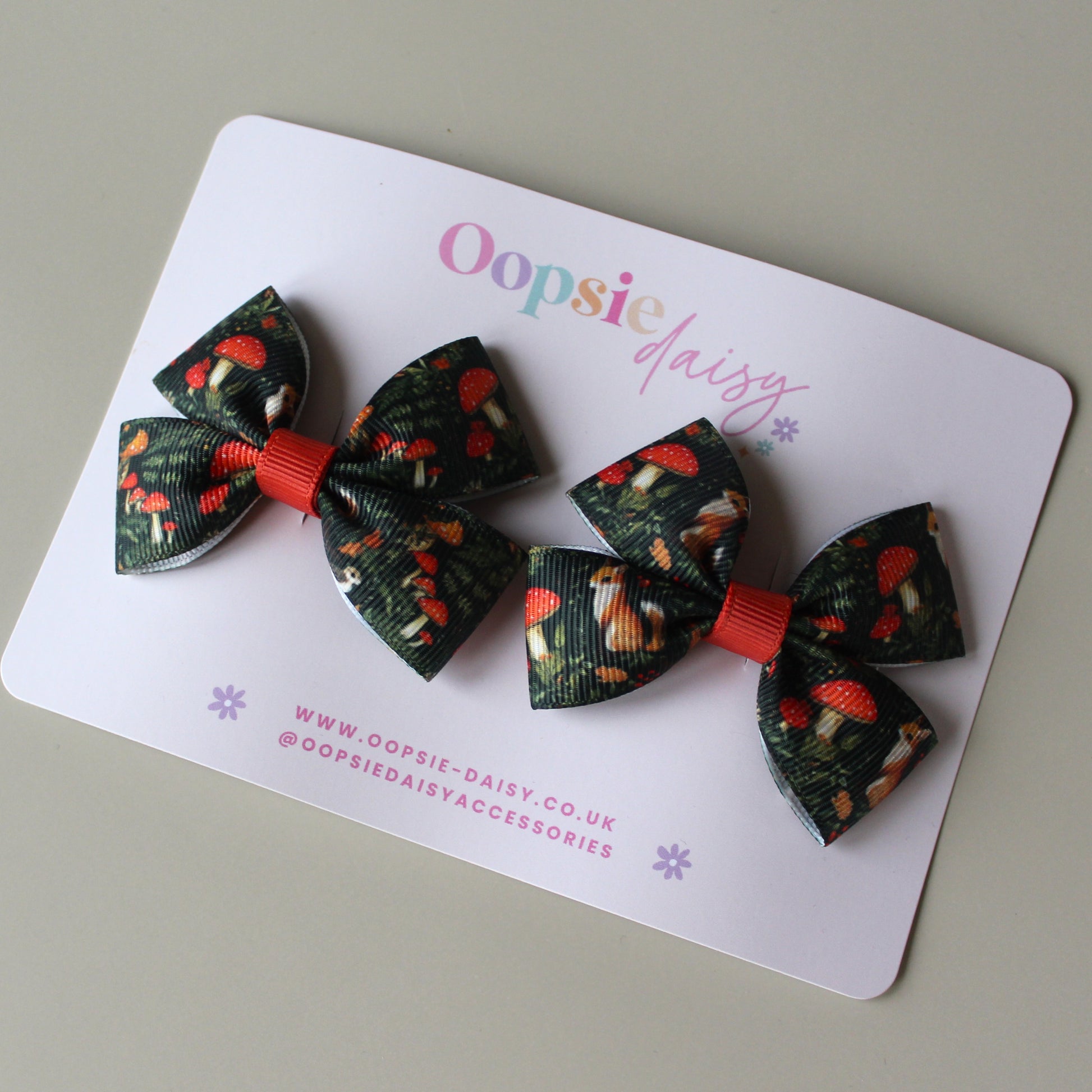 Autumnal woodland patterned hair bows with squirrels and mushrooms