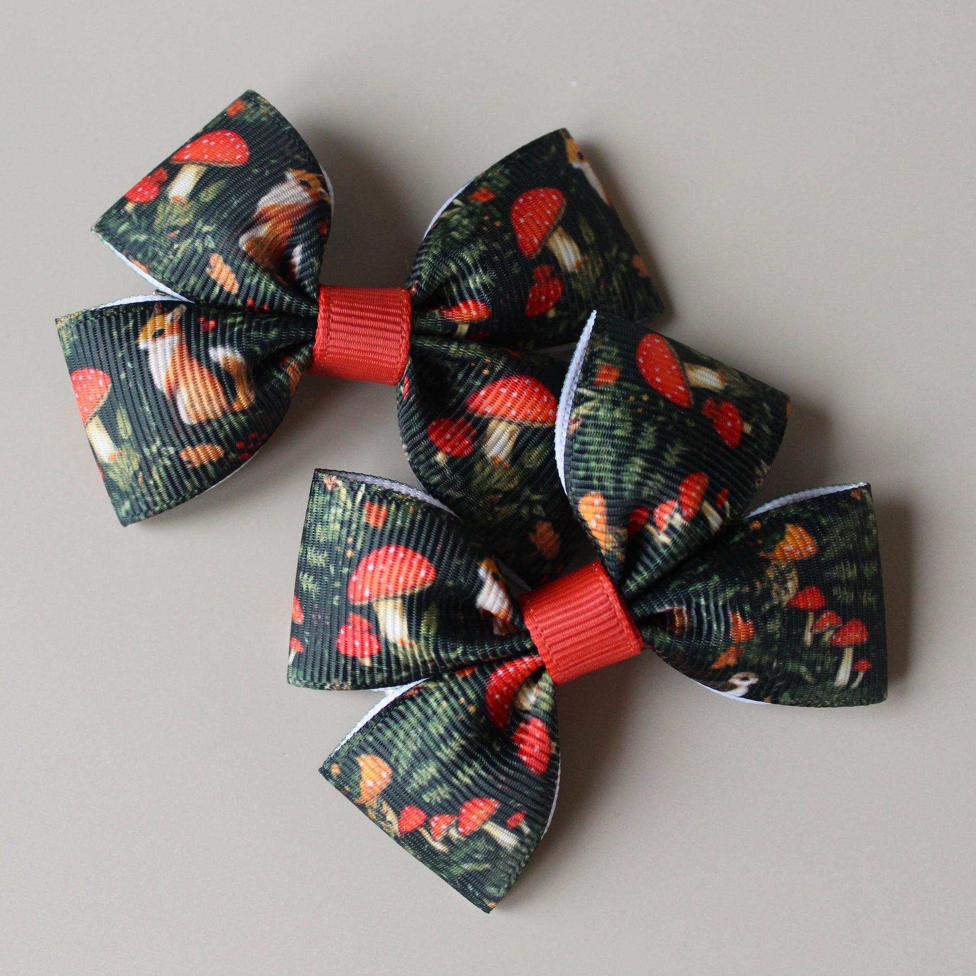 Autumnal woodland patterned hair bows with squirrels and mushrooms
