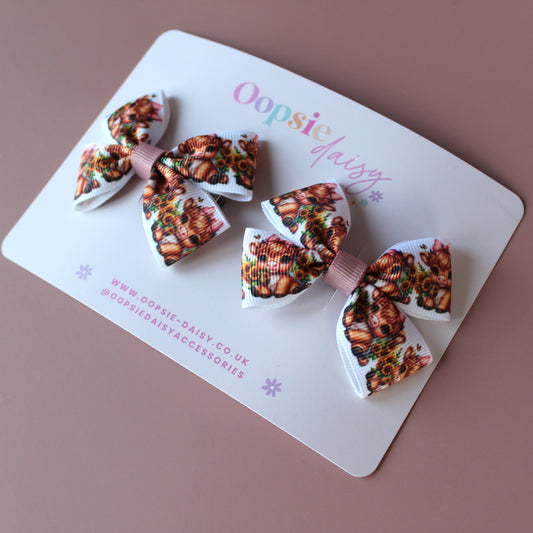 Two hair bows with cute baby cow pattern