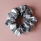 Black and white monochrome tartan scrunchie