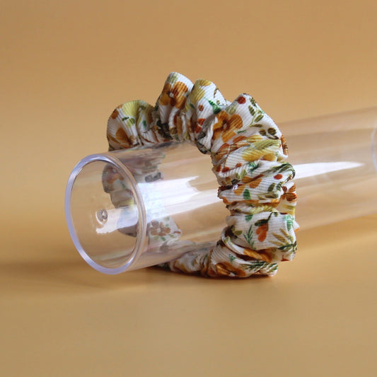 Floral patterned scrunchie in cord fabric