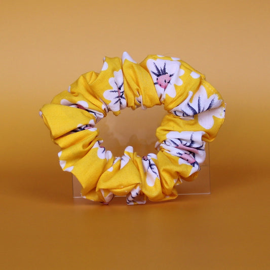Yellow scrunchie with daisy flower pattern
