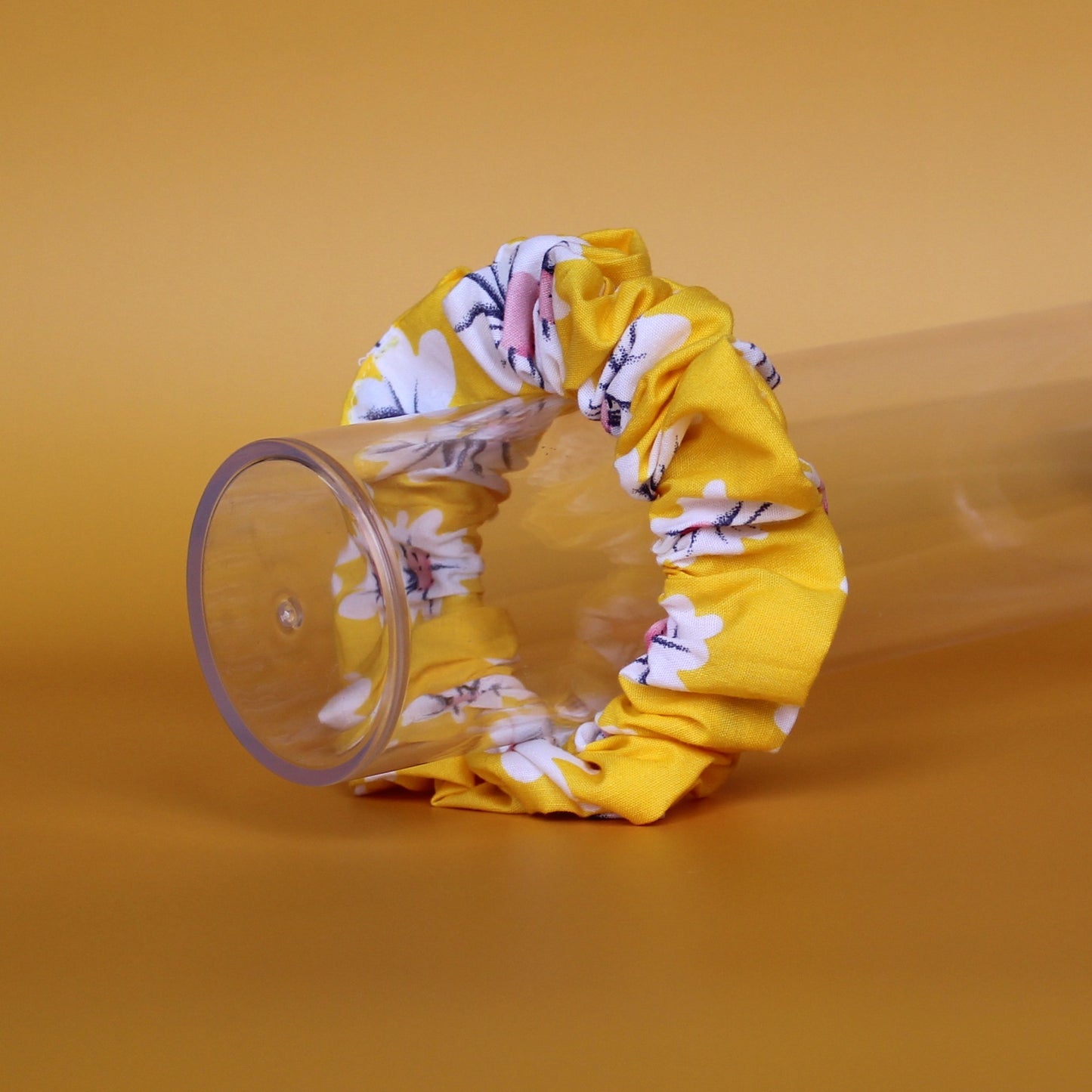 Yellow scrunchie with daisy flower pattern