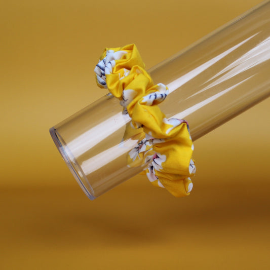 Yellow scrunchie with daisy flower pattern