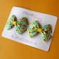 Hair bows with green and yellow sunflowers